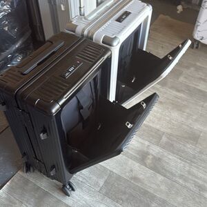 Black and Silver Rolling Suitcases
